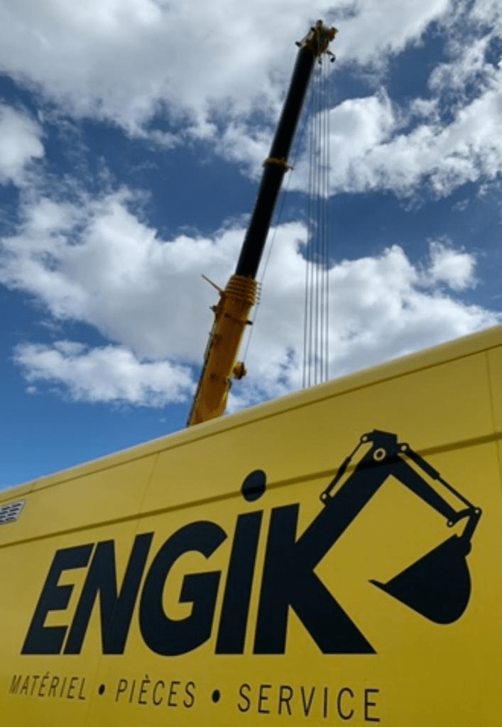 Engik truck with crane in the background